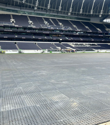 installed stadium-size temporary floor drain for construction